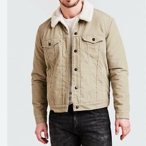 Levi Strauss Premium trucker jacket in beige corduroy and shearling lining.